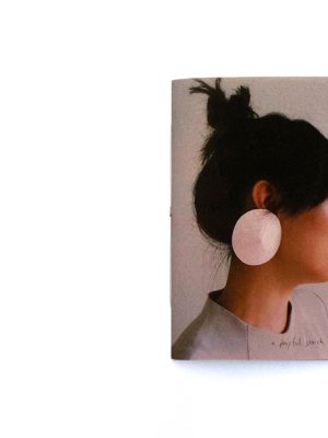 Earrings Book. Paper earrings, photography and design by Anna Gleesson. Model: Jenny Soo Yeon Lee.